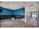 Open floor plan room featuring wood-look floors and a chalkboard accent wall at 960 Corn Husk Loop, Conway, SC 29527