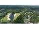 Aerial view of the pond, golf course, and lush greenery at 974 Crooked Oak Dr., Pawleys Island, SC 29585