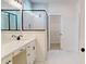 Modern bathroom featuring double vanity, shower, and walk-in closet at 974 Crooked Oak Dr., Pawleys Island, SC 29585