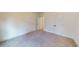 Carpeted bedroom with white walls and trim, and a view of the closet at 974 Crooked Oak Dr., Pawleys Island, SC 29585