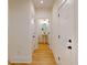Hallway leading to bathroom with pedestal sink at 974 Crooked Oak Dr., Pawleys Island, SC 29585