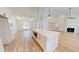 Spacious kitchen with island open to living area and featuring modern finishes and appliances at 974 Crooked Oak Dr., Pawleys Island, SC 29585