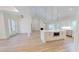Open-concept living space featuring a fireplace and chef's kitchen at 974 Crooked Oak Dr., Pawleys Island, SC 29585