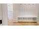Mudroom featuring a built-in bench with storage and coat hooks at 974 Crooked Oak Dr., Pawleys Island, SC 29585