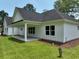 Rear exterior featuring a covered patio perfect for outdoor relaxation at 974 Crooked Oak Dr., Pawleys Island, SC 29585