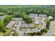 Aerial view of an attractive community with well-maintained landscaping, ample parking, and charming residential buildings at 1001 Dinger Ct. # 1001, Myrtle Beach, SC 29588