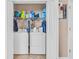 Laundry closet, complete with washer, dryer, and shelving for storage at 1001 Dinger Ct. # 1001, Myrtle Beach, SC 29588