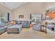 Spacious living room featuring a vaulted ceiling, large sofa, and inviting decor at 1001 Dinger Ct. # 1001, Myrtle Beach, SC 29588