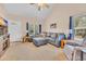 Comfortable living area featuring a large sectional sofa and ample natural light at 1001 Dinger Ct. # 1001, Myrtle Beach, SC 29588