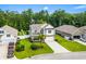 Aerial view of a well-maintained home with green lawn and fence in a suburban neighborhood at 1007 Oak Marsh Ln., North Myrtle Beach, SC 29582