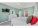 Bedroom with a large bed and neutral walls featuring a dresser with TV at 1007 Oak Marsh Ln., North Myrtle Beach, SC 29582