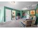 Spacious bonus room featuring wall decor, neutral carpeting, and easy access to other areas at 1007 Oak Marsh Ln., North Myrtle Beach, SC 29582