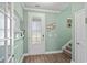 Welcoming entryway with wood-look floors and neutral paint and detailed trim at 1007 Oak Marsh Ln., North Myrtle Beach, SC 29582