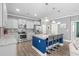 Modern kitchen boasts stainless steel appliances, granite counters, and island with bar seating at 1007 Oak Marsh Ln., North Myrtle Beach, SC 29582