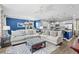Open-concept living area with a spacious layout, connecting the living room and the kitchen at 1007 Oak Marsh Ln., North Myrtle Beach, SC 29582
