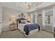 Beautifully decorated bedroom featuring stylish nautical themed decor, a ceiling fan, and plenty of natural light at 1011 Sable Palm Way, Surfside Beach, SC 29575
