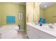 Well-lit bathroom showcasing a double vanity, soaking tub, and modern fixtures at 106 Scotch Broom Dr. # 105, Little River, SC 29566