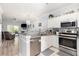 Modern kitchen with granite countertops, stainless steel appliances, and an open layout at 106 Scotch Broom Dr. # 105, Little River, SC 29566