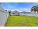 Large, private backyard with white fence, perfect for outdoor activities at 1077 Stoney Falls Blvd., Myrtle Beach, SC 29579