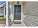 Inviting front entrance with a black door and stylish welcome mat at 1077 Stoney Falls Blvd., Myrtle Beach, SC 29579