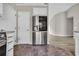Kitchen featuring a modern LG refrigerator, white cabinets, and stylish tile flooring at 1077 Stoney Falls Blvd., Myrtle Beach, SC 29579