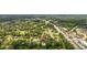 Aerial view of the home surrounded by green trees in a vibrant neighborhood and an arrow pointing towards the house at 109 Wofford Rd., Conway, SC 29526