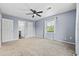 Bedroom featuring carpet flooring, a ceiling fan, and a window with natural light at 109 Wofford Rd., Conway, SC 29526