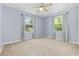 Bright bedroom with two large windows and neutral carpeting at 109 Wofford Rd., Conway, SC 29526