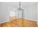 Elegant dining room featuring a chandelier with a view to the living room and kitchen at 109 Wofford Rd., Conway, SC 29526