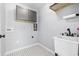 Laundry room with tile flooring, a utility sink, and upper cabinets at 109 Wofford Rd., Conway, SC 29526
