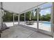 Screened patio with views of the backyard pool and lush greenery at 109 Wofford Rd., Conway, SC 29526