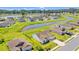Aerial view of a beautiful home with a fenced-in backyard in a tranquil community with ponds and well-kept lawns at 1108 Donald St., Conway, SC 29527