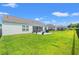Expansive backyard featuring a lush lawn, privacy fence, patio and screened-in porch at 1108 Donald St., Conway, SC 29527