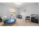 Versatile bedroom space that is currently set up with exercise equipment and offers backyard views at 1108 Donald St., Conway, SC 29527