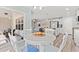 Bright dining area flowing into an open kitchen with stainless steel appliances and access to the outdoor living area at 1108 Donald St., Conway, SC 29527
