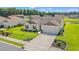 Well-maintained single-story home with a two-car garage and manicured front yard, showcasing charm and curb appeal at 1108 Donald St., Conway, SC 29527