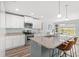 Modern kitchen features a large island with granite countertops and stainless steel appliances at 1108 Donald St., Conway, SC 29527