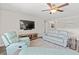Open living space with plush seating, modern TV, and ceiling fan for relaxed living at 1108 Donald St., Conway, SC 29527