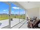 Enjoy outdoor living on this screened porch with comfortable seating and views of the well-maintained backyard at 1108 Donald St., Conway, SC 29527