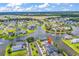 Aerial view of community featuring winding waterways, lush landscaping, and single-Gathering homes at 1112 Whispering Winds Dr., Myrtle Beach, SC 29579