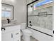 Modern bathroom featuring elegant marble tile in the shower and updated black hardware at 1112 Whispering Winds Dr., Myrtle Beach, SC 29579