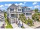 Stunning elevated home with a neutral color palette, manicured landscaping, and convenient garage access at 1112 Whispering Winds Dr., Myrtle Beach, SC 29579