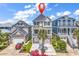 Eye-catching exterior view of an elevated home with a red map marker for an optimized visual search result at 1112 Whispering Winds Dr., Myrtle Beach, SC 29579