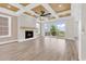 Spacious living room offers recessed ceilings, a fireplace, and access to outdoor living space at 1112 Whispering Winds Dr., Myrtle Beach, SC 29579