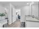 Bright bathroom with dual sinks and a view of a bedroom that offers plenty of space at 113 Arbor Crest Ln., Tabor City, NC 28463