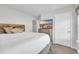 Relaxing bedroom with a TV, soft bed, neutral paint, and dresser at 113 Arbor Crest Ln., Tabor City, NC 28463