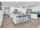 Bright kitchen with stainless steel appliances, a large island, and seating at 113 Arbor Crest Ln., Tabor City, NC 28463