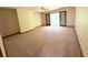 Bedroom with french doors, neutral paint and carpet, providing access to an outdoor space at 116 Capt Anthony White Ln., Georgetown, SC 29440