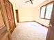 Comfortable bedroom featuring carpet, neutral paint, ceiling fan and window for natural light at 116 Capt Anthony White Ln., Georgetown, SC 29440