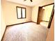 Bedroom with neutral carpet, paint and trim and a window for natural light and a ceiling fan at 116 Capt Anthony White Ln., Georgetown, SC 29440